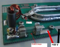 The ATC is used as a pilar and a piece of copper is used as a bridge between the coax and the ATC.<br />You can't see the 1NF ATC, but it is there soldered to the GND.